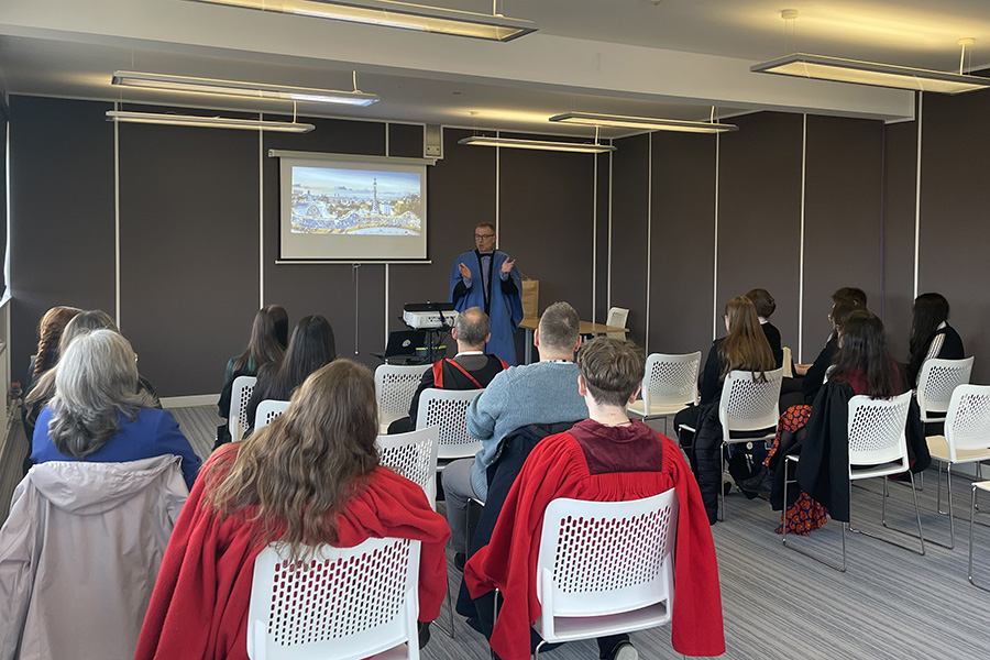 Professor Roger Rees welcoming young learners